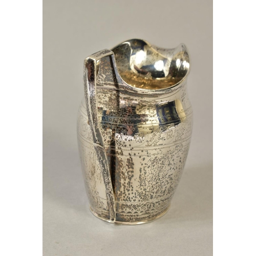 115 - A GEORGE III SILVER HELMET SHAPED CREAM JUG, bright cut decoration, maker's mark partially rubbed, L... 