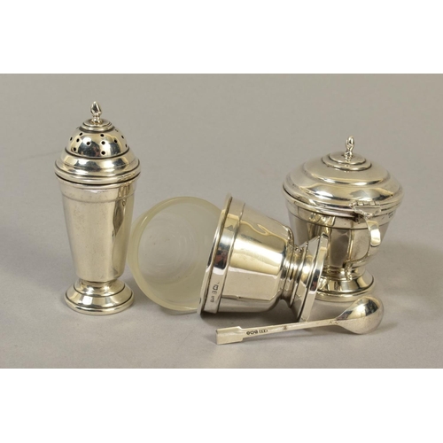 120 - A GEORGE VI SILVER THREE PIECE CRUET SET, of conical form, comprising pepperette, open salt with gla... 