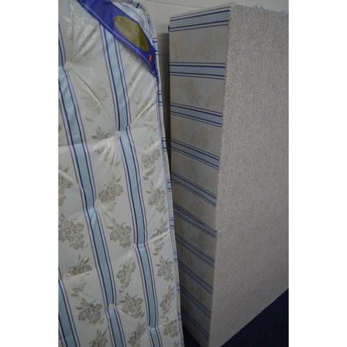 1206 - A 4' 6'' SNOOZE UK DIVAN BED AND MATTRESS, with blue stripes and foliate decoration