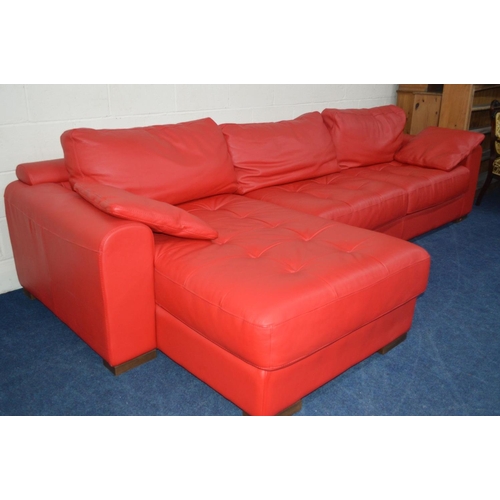 1211 - A BRIGHT RED LEATHER LA METEORA CORNER SOFA on wooden block legs together with two cushions, length ... 