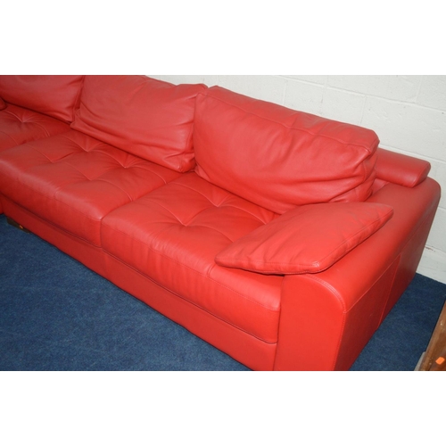 1211 - A BRIGHT RED LEATHER LA METEORA CORNER SOFA on wooden block legs together with two cushions, length ... 