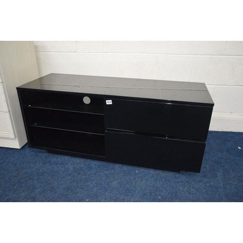 1212 - A MODERN BLACK GLOSS TV CABINET WITH TWO DRAWERS together with a modern limed effect desk with three... 