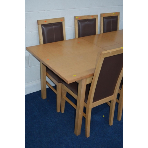 1215 - A RECTANGULAR EXTENDING BEECH DINING TABLE with six matching leatherette chairs (7)