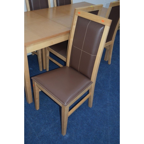 1215 - A RECTANGULAR EXTENDING BEECH DINING TABLE with six matching leatherette chairs (7)