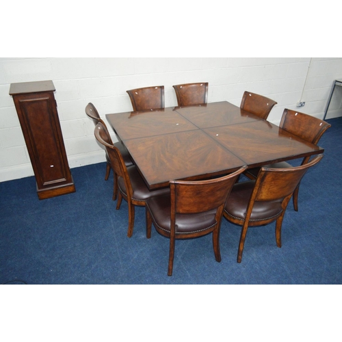 1216 - A SQUARE REPRODUCTION FLAME MAHOGANY AND MAHOGANY BANDED FINISH EXTENDING DINING TABLE, extending at... 