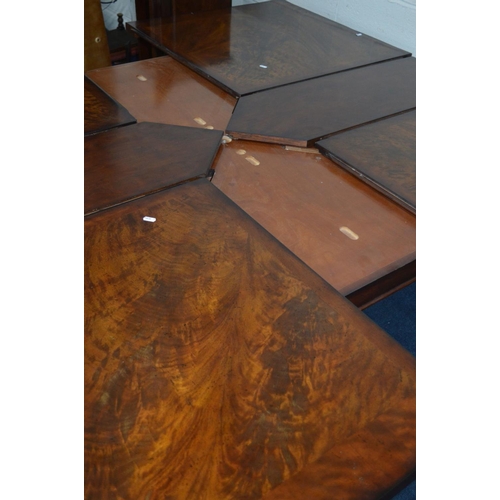 1216 - A SQUARE REPRODUCTION FLAME MAHOGANY AND MAHOGANY BANDED FINISH EXTENDING DINING TABLE, extending at... 