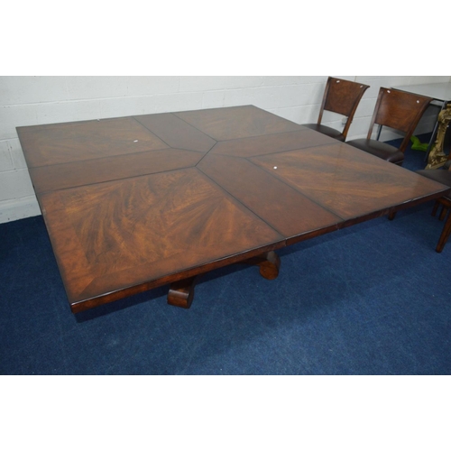 1216 - A SQUARE REPRODUCTION FLAME MAHOGANY AND MAHOGANY BANDED FINISH EXTENDING DINING TABLE, extending at... 