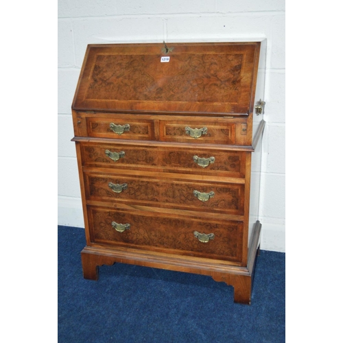 1219 - A REPRODUCTION LADIES BURR WALNUT BUREAU with two short and three long graduating drawers, inside a ... 