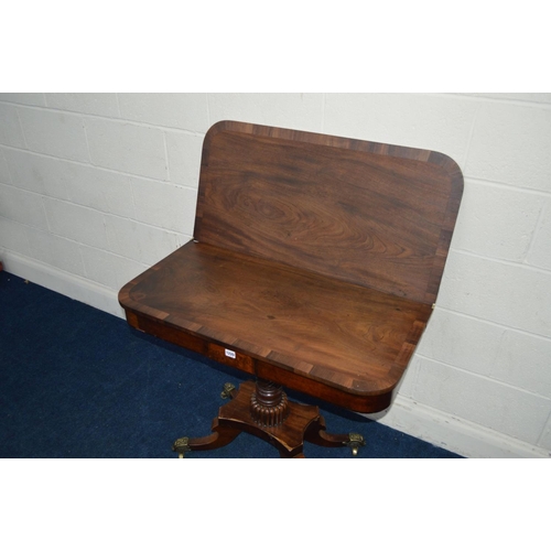 1220 - A REGENCY MAHOGANY TEA TABLE, with cross banding detail to top, central support in the form of barle... 