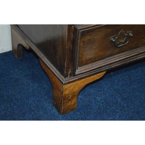 1222 - TWO EARLY 20TH CENTURY OAK CHEST OF THREE LONG DRAWERS, on bracket feet, in two sizes, biggest chest... 