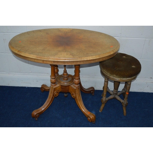 1223 - A LATE 19TH CENTURY BURR WALNUT CENTRE TABLE on a scrolled base together with an Edwardian swivel st... 