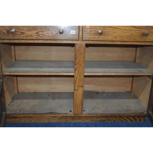 1225 - A 1940'S OAK SIDEBOARD with two drawers, width 121cm x depth 47cm x height 83cm