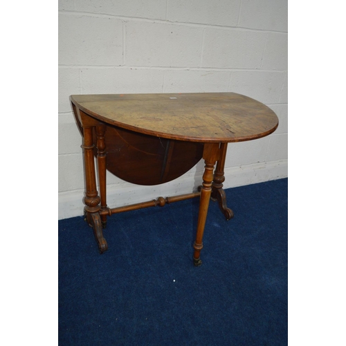 1227 - A LATE 19TH CENTURY BURR WALNUT OVAL TOPPED SUTHERLAND TABLE on twin fluted legs and turned stretche... 