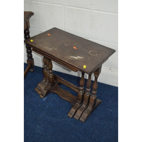 1228 - AN OAK BIBLE BOX on twin legs, together with a late 20th Century oak nest of three tables and an oak... 