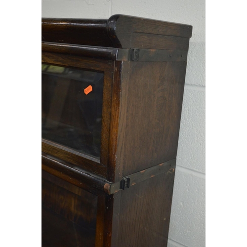 1243 - AN OAK FOUR SECTIONAL BOOKCASE, the Globe-Wernicke Co Limited, London, with glazed flap front sectio... 