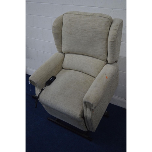 1245 - A BEIGE UPHOLSTERED ELECTRIC RISE AND RECLINE ARMCHAIR, (PAT pass and in working order)