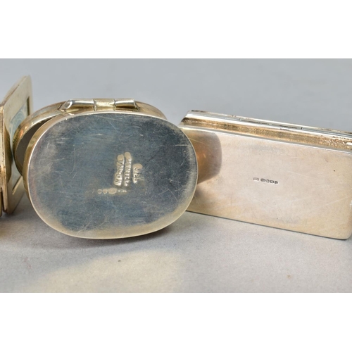 128 - FOUR MODERN SILVER PILL/STAMP BOXES, comprising a pair of Mexican oval boxes, a rectangular box with... 