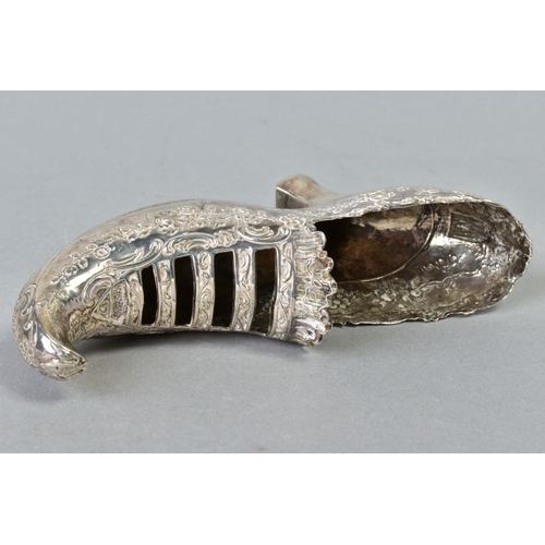 129 - A CONTINENTAL SILVER (800) LADIES SHOW, embossed floral decoration, marks to underside of heel, spli... 