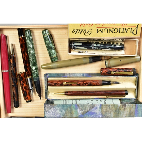 134 - TWO SLIM WOODEN TRAYS CONTAINING MOSTLY VINTAGE PENS AND PENCILS, including a boxed John Bull founta... 