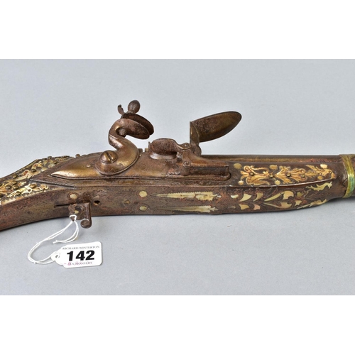 142 - AN ANTIQUE ARAB FLINTLOCK MUZZLE LOADING MUSKET, with decorative bone and mother of pearl inlays to ... 