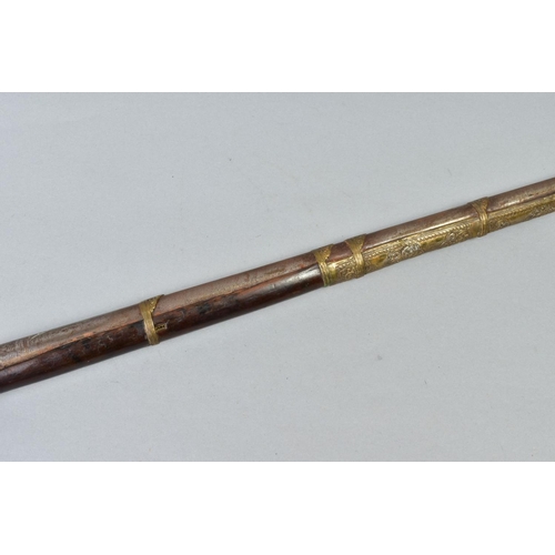 142 - AN ANTIQUE ARAB FLINTLOCK MUZZLE LOADING MUSKET, with decorative bone and mother of pearl inlays to ... 