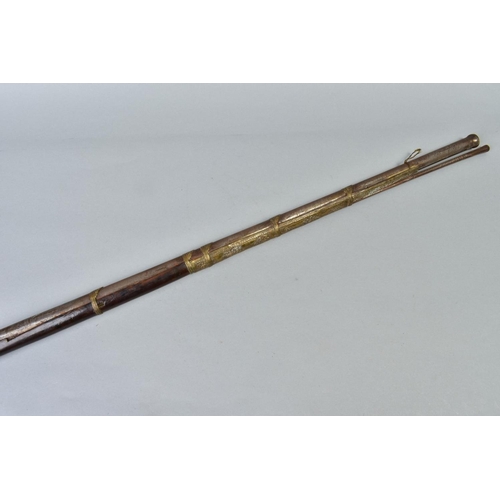 142 - AN ANTIQUE ARAB FLINTLOCK MUZZLE LOADING MUSKET, with decorative bone and mother of pearl inlays to ... 