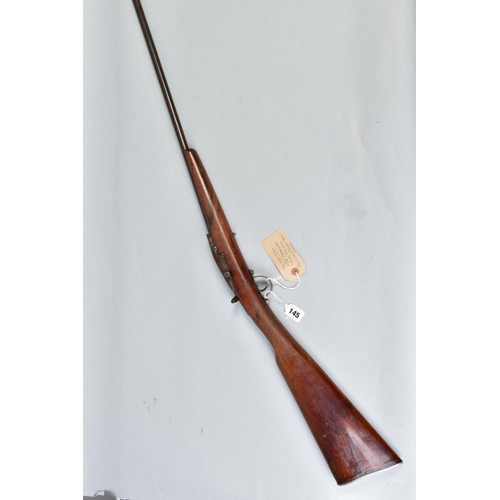 145 - A .410'' 21/2 CHAMBERED SINGLE BARREL SHOTGUN made in Europe fitted with a vertically hinged breech ... 