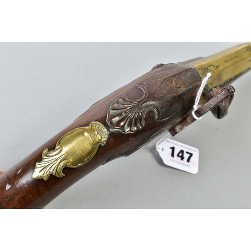 147 - A 21 BORE BRASS BARREL FLINTLOCK HOLSTER PISTOL dating from the late 1700's, it's 8'' brass barrel i... 