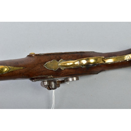 147 - A 21 BORE BRASS BARREL FLINTLOCK HOLSTER PISTOL dating from the late 1700's, it's 8'' brass barrel i... 