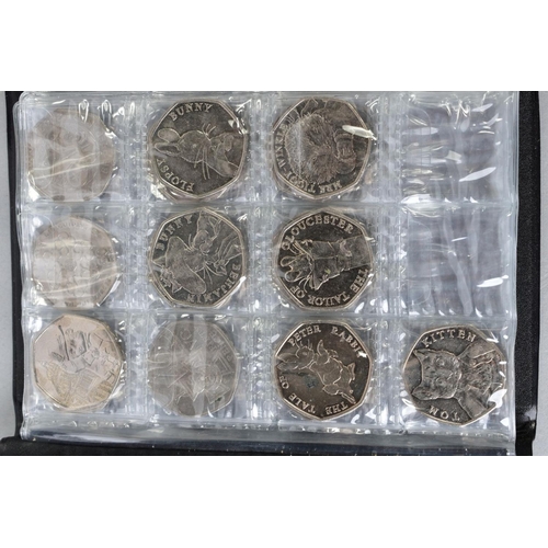 157 - A PLASTIC BOX WITH MIXED COINS to include a wallet of sixteen current 50p coins and a silver sceat e... 