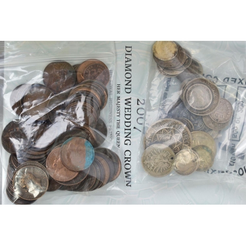 158 - THREE PLASTIC TUBS CONTAINING UK AND WORLD COINAGE, to include a Royal Mint carded 2007 five pounds,... 