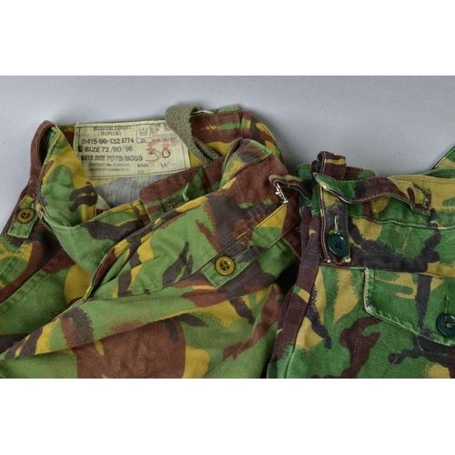 167 - FIVE ITEMS OF BRITISH ARMY CAMO KIT, three pairs of trousers, one lightweight, two jackets/shirts, o... 