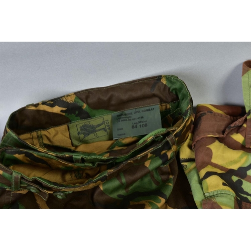 167 - FIVE ITEMS OF BRITISH ARMY CAMO KIT, three pairs of trousers, one lightweight, two jackets/shirts, o... 