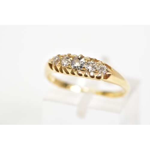 24 - AN EARLY 20TH CENTURY 18CT GOLD FIVE STONE DIAMOND RING, designed as a line of five graduated old cu... 