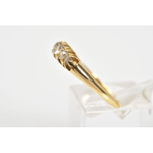 24 - AN EARLY 20TH CENTURY 18CT GOLD FIVE STONE DIAMOND RING, designed as a line of five graduated old cu... 