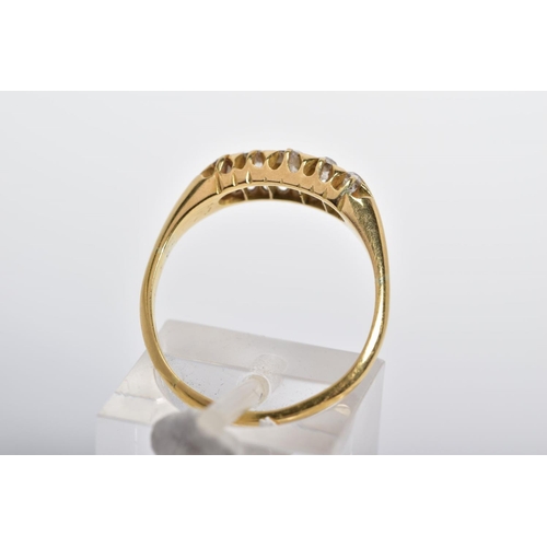 24 - AN EARLY 20TH CENTURY 18CT GOLD FIVE STONE DIAMOND RING, designed as a line of five graduated old cu... 