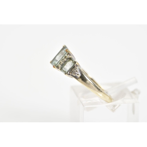 26 - A 9CT WHITE GOLD GEM SET RING, designed as three graduated rectangular blue gems, assessed as blue t... 