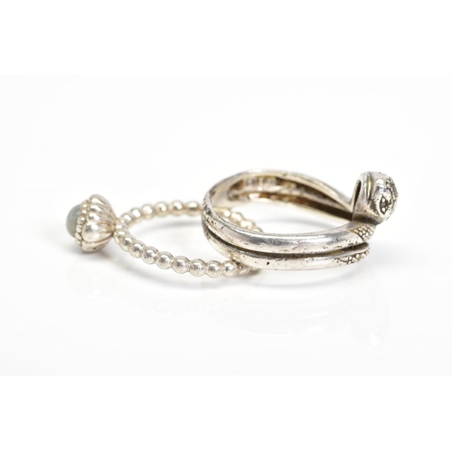 32 - A PANDORA RING AND A SNAKE RING, the Pandora ring designed with a circular rock crystal cabochon wit... 