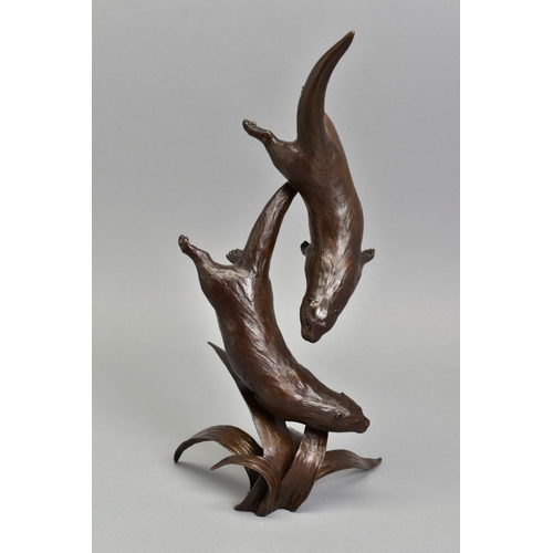 330 - MICHAEL SIMPSON (BRITISH CONTEMPORARY) 'OUT TO PLAY', a bronze sculpture of otters at play above fol... 