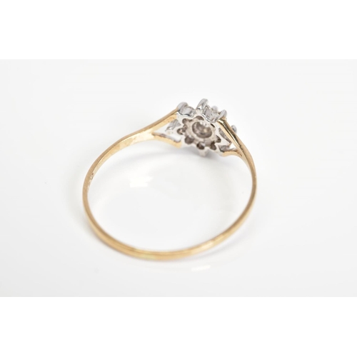 34 - A 9CT GOLD CUBIC ZIRCONIA CLUSTER RING, designed as a cluster of circular colourless cubic zirconias... 