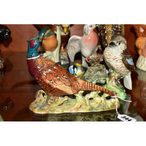 344 - SEVEN BESWICK BIRDS AND A CONTINENTAL PORCELAIN KINGFISHER, the Beswick birds comprising Green Woodp... 