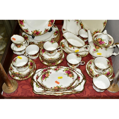 353 - ROYAL ALBERT 'OLD COUNTRY ROSES', comprising of tea pot, coffee pot, gravy and saucer, seven dinner ... 