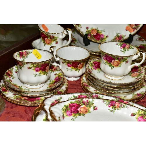 353 - ROYAL ALBERT 'OLD COUNTRY ROSES', comprising of tea pot, coffee pot, gravy and saucer, seven dinner ... 