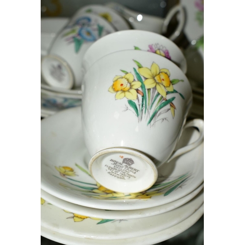 366 - ROYAL ALBERT 'FLOWER OF THE MONTH' TEAWARES comprising of twelve tea cups and saucers, twelve tea pl... 