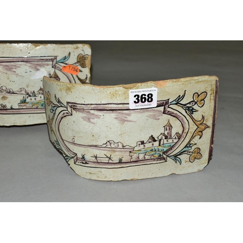 368 - A PAIR OF 18TH CENTURY FAIENCE ROUNDED CORNER FIREPLACE TILES/BRICKS, both painted with landscapes w... 