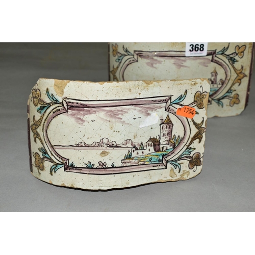 368 - A PAIR OF 18TH CENTURY FAIENCE ROUNDED CORNER FIREPLACE TILES/BRICKS, both painted with landscapes w... 