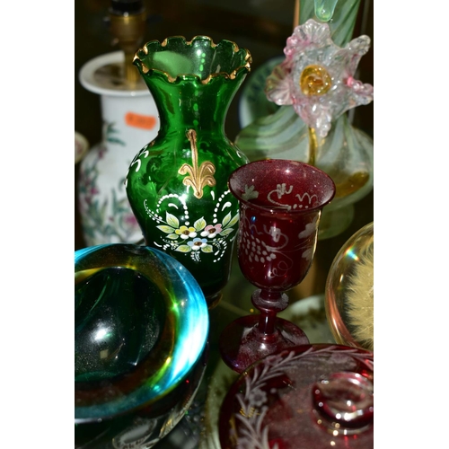 372 - A GROUP OF GLASSWARE to include a pair of iridescent vases, having tube lined floral decoration, sig... 