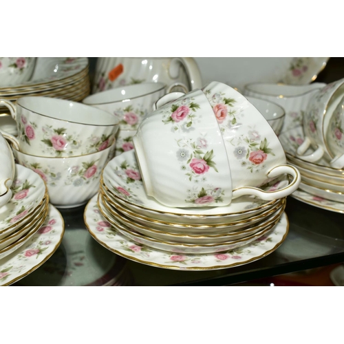 374 - MINTON 'SPRING BOUQUET' TEA AND DINNER WARES, comprising teapot, oval cake plate, twelve tea cups, e... 