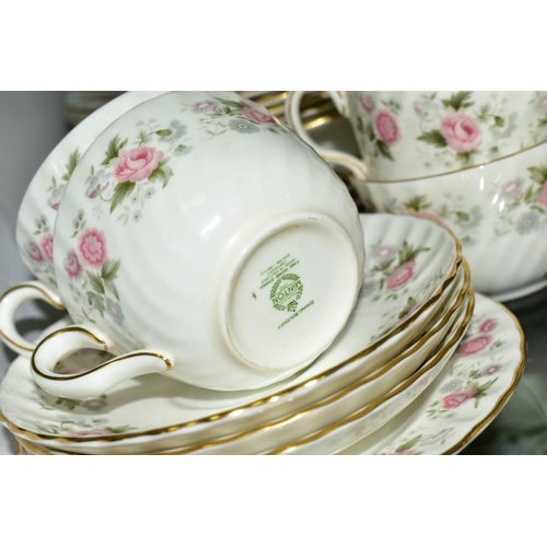 374 - MINTON 'SPRING BOUQUET' TEA AND DINNER WARES, comprising teapot, oval cake plate, twelve tea cups, e... 