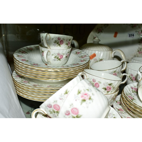 374 - MINTON 'SPRING BOUQUET' TEA AND DINNER WARES, comprising teapot, oval cake plate, twelve tea cups, e... 